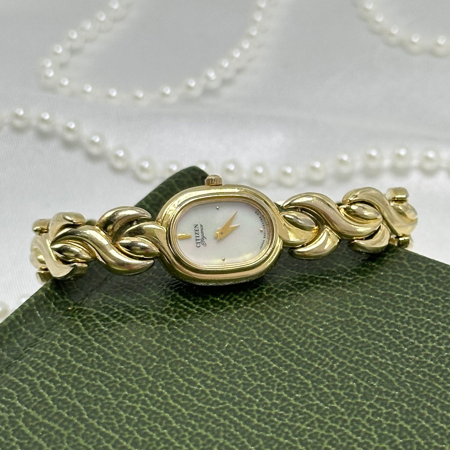 Dainty Gold Citizen Watch with Mother of Pearl Dial
