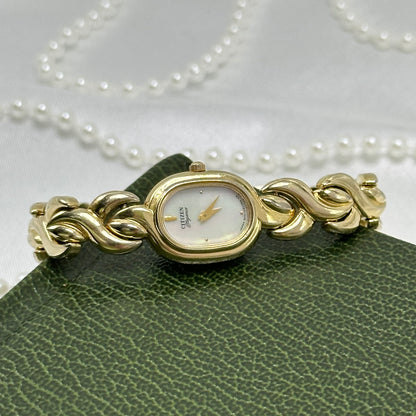 Dainty Gold Citizen Watch with Mother of Pearl Dial
