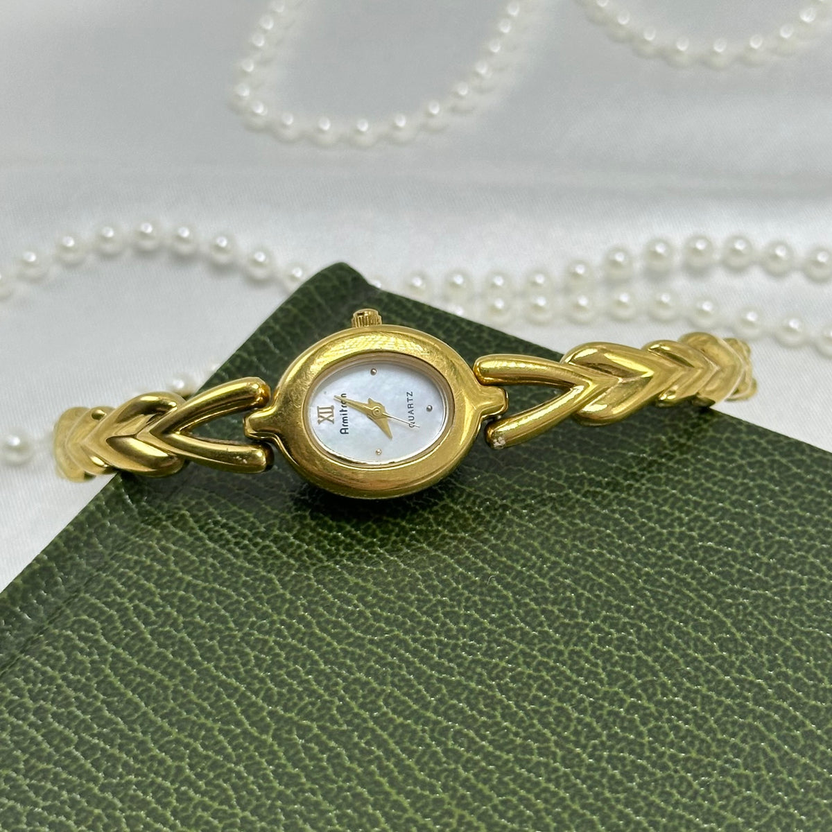 Adorable Gold Armitron Watch with Mother of Pearl Dial