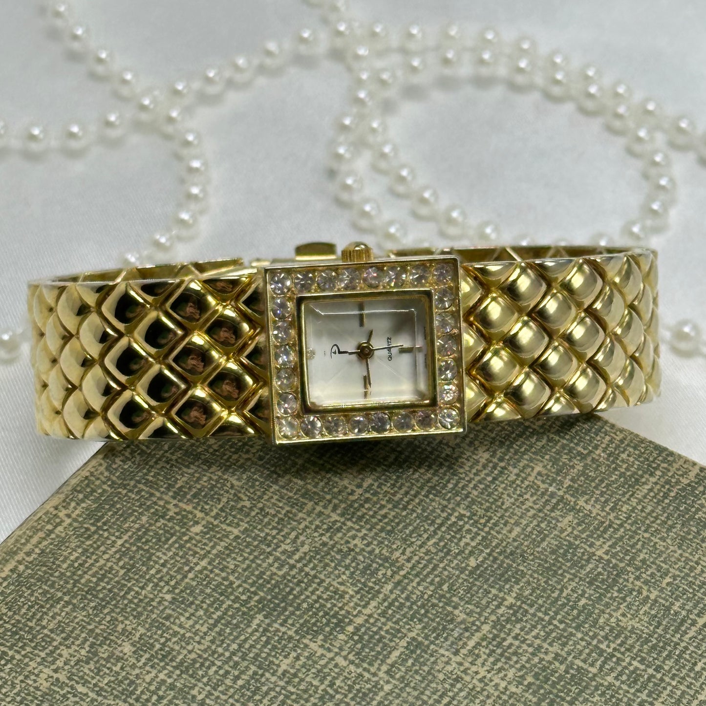 Luxury Gold Tank Watch with Quilted Band