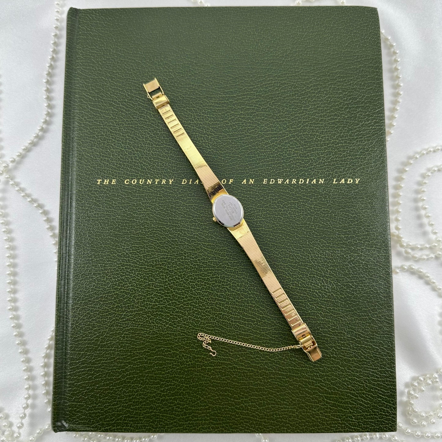 Gold Elgin Watch with Detailed Swirl Band