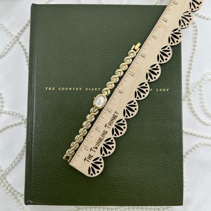 Dainty Gold Citizen Watch with Mother of Pearl Dial