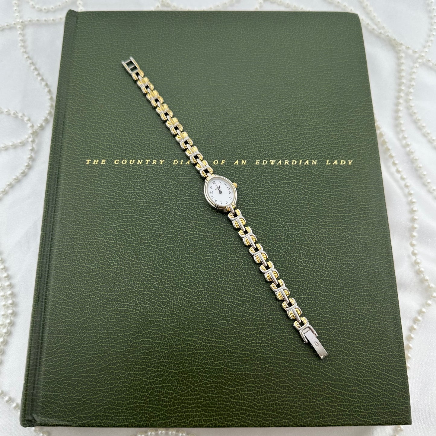 Slender Two-Tone Bulova Watch with Oval Dial