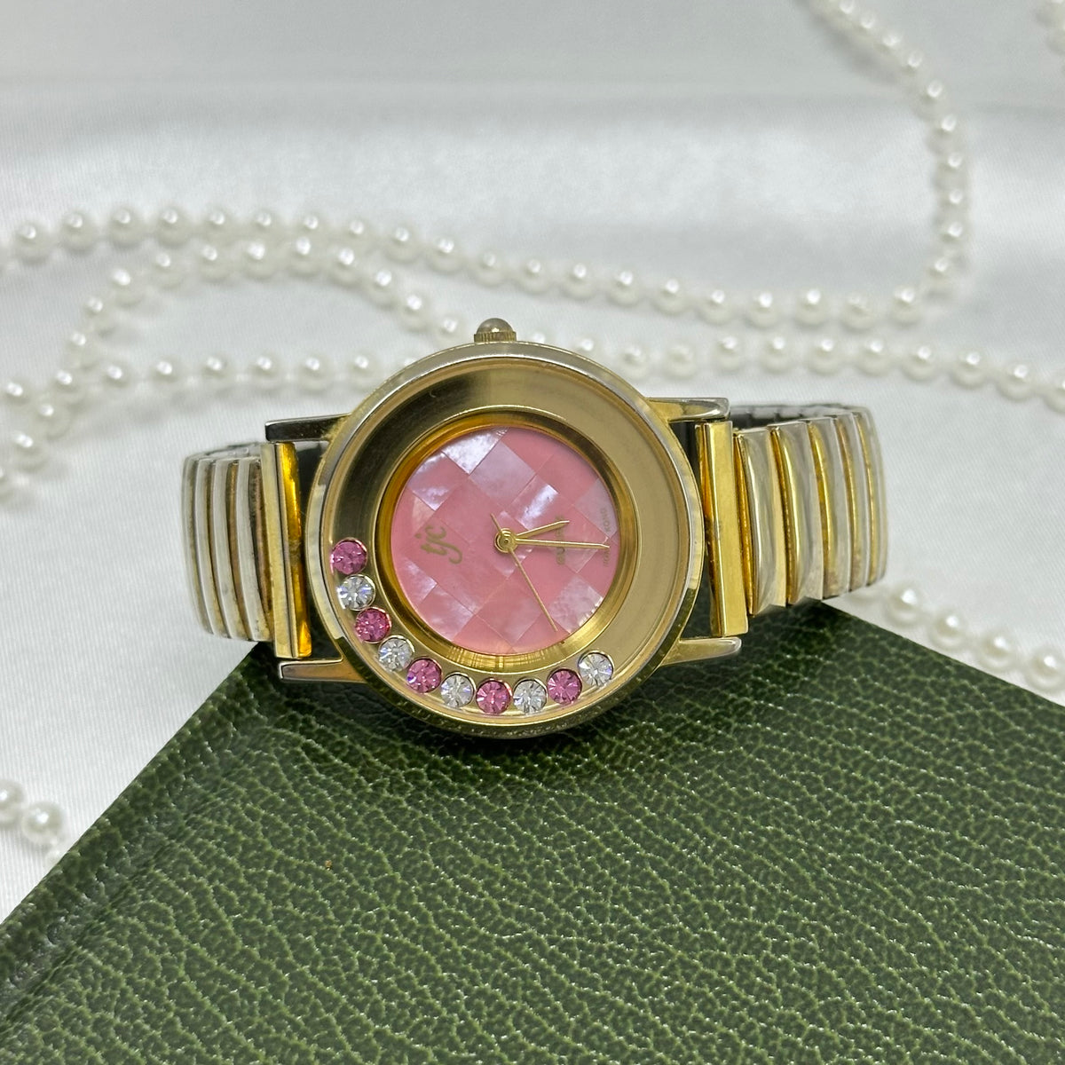 Pink and White Floating Crystal Dial Gold Watch