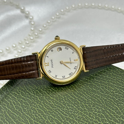 Vintage Gold Pulsar Watch with Brown Leather Band and Date Display