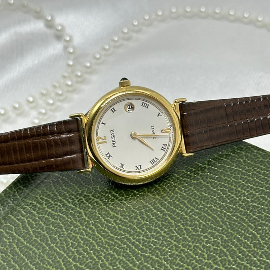 Vintage Gold Pulsar Watch with Brown Leather Band and Date Display