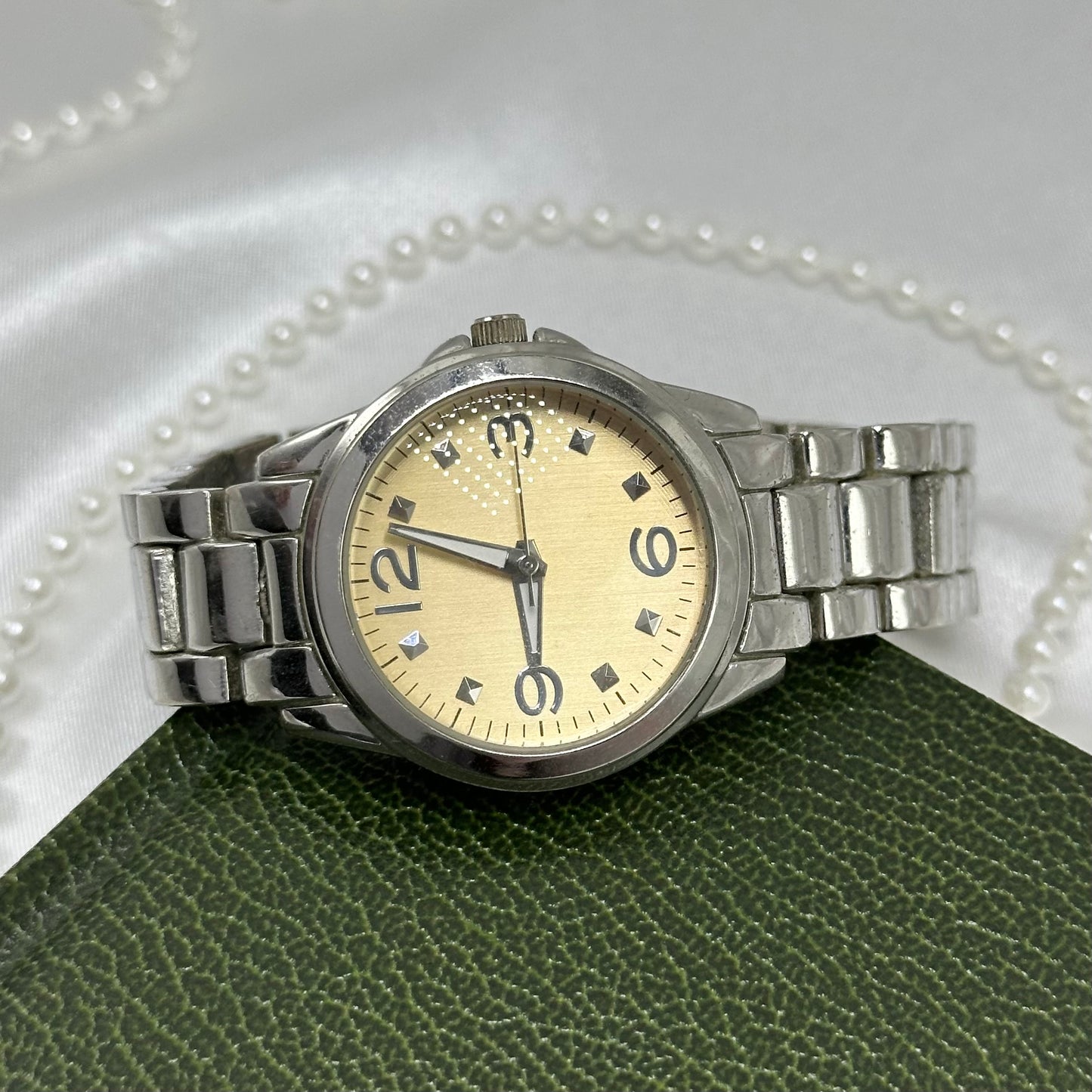 Silver Round Champagne Dial Watch