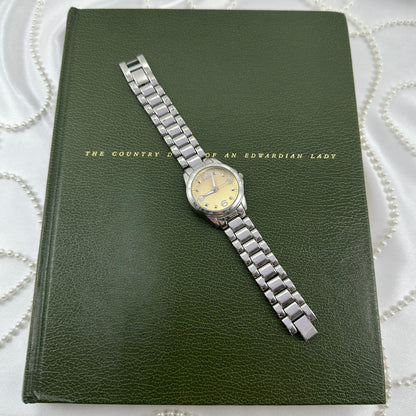 Silver Round Champagne Dial Watch