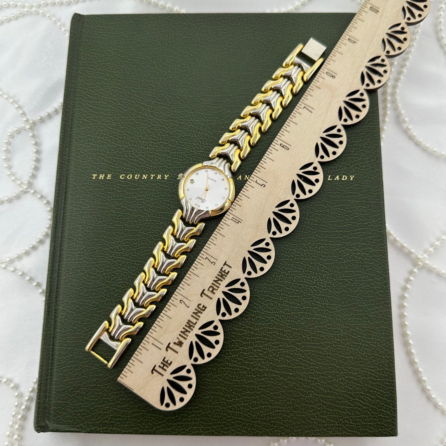 Two-Tone Pearl Watch with Large Round Dial and Date Display