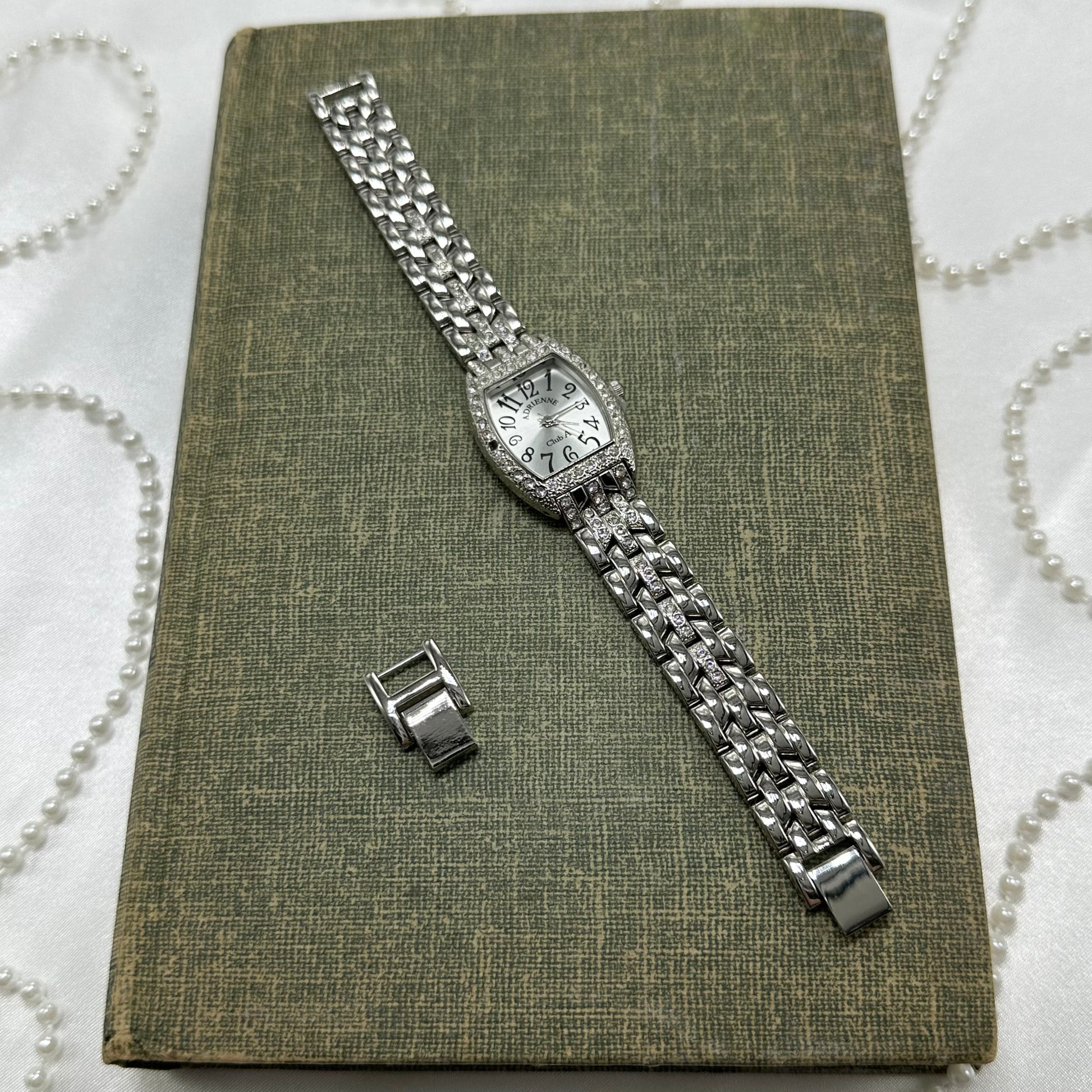 Vintage silver tone diamanté Adrienne Club A watch with quartz movement.