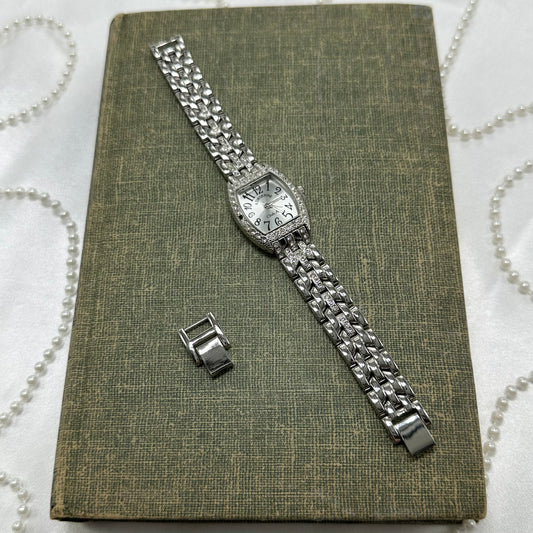 Vintage silver tone diamanté Adrienne Club A watch with quartz movement.