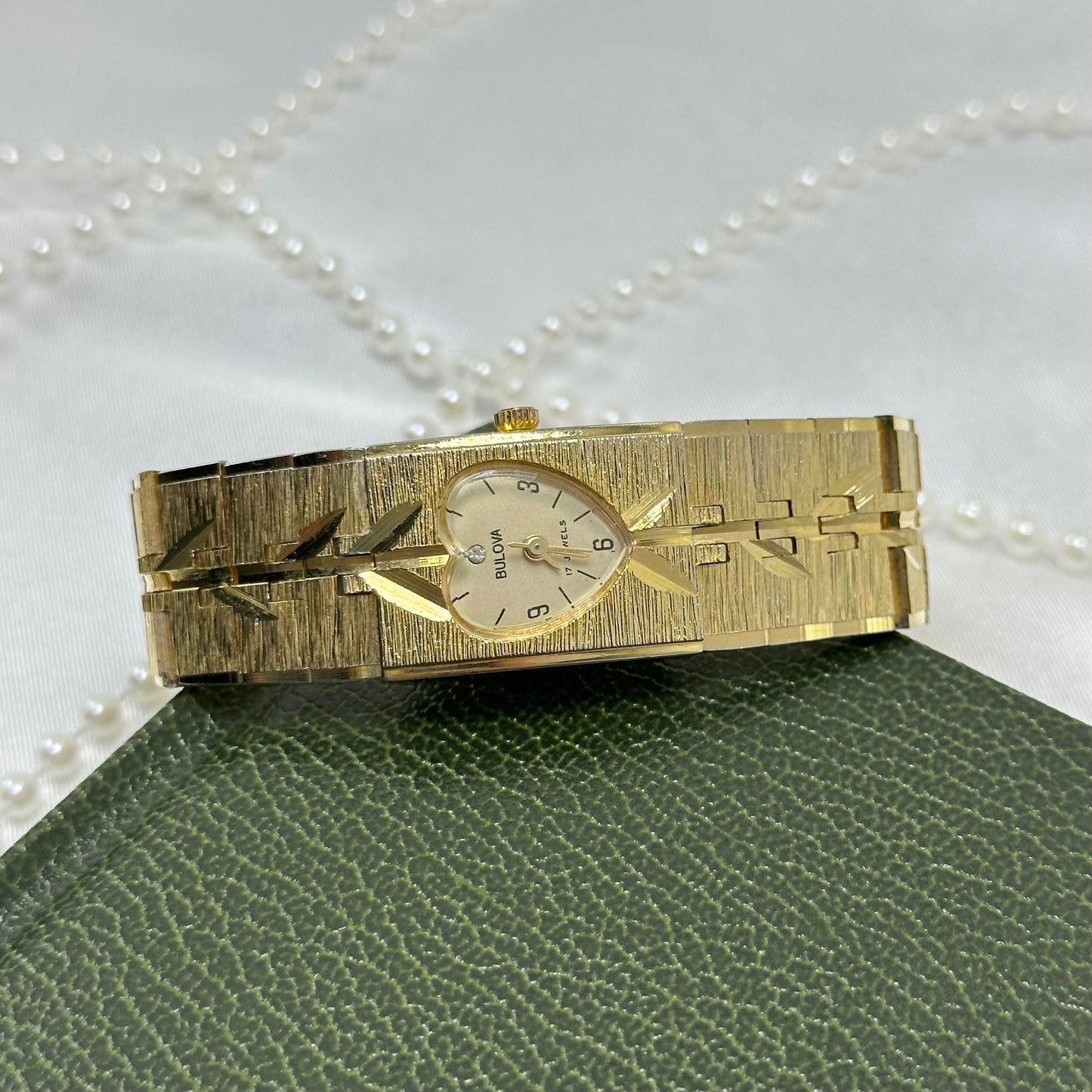 Rare Gold Vintage Bulova Tank Watch with Vine Details and Heart Dial