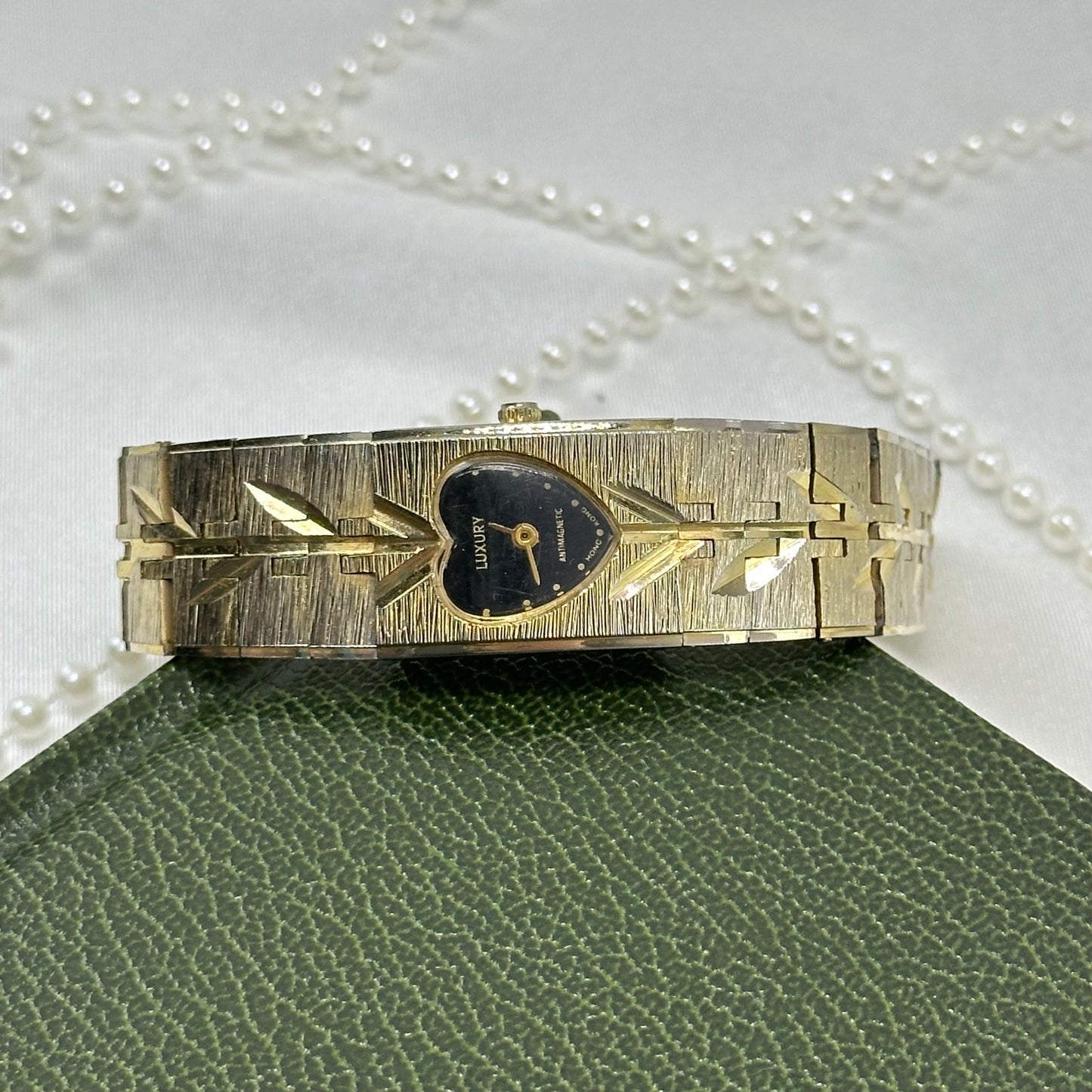 Rare Gold Vintage Luxury Tank Watch with Vine Details and Black Heart Dial