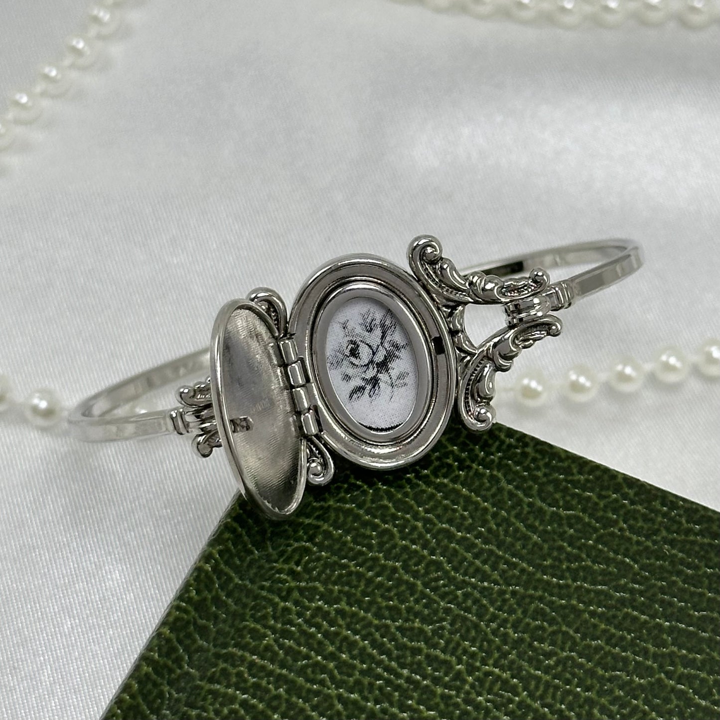 1970's Vintage Silver Avon Hidden Locket Bangle