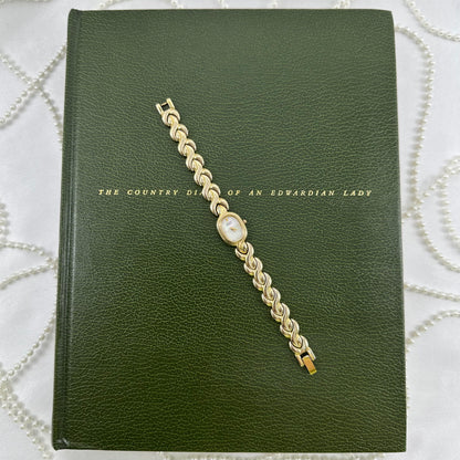 Dainty Gold Citizen Watch with Mother of Pearl Dial