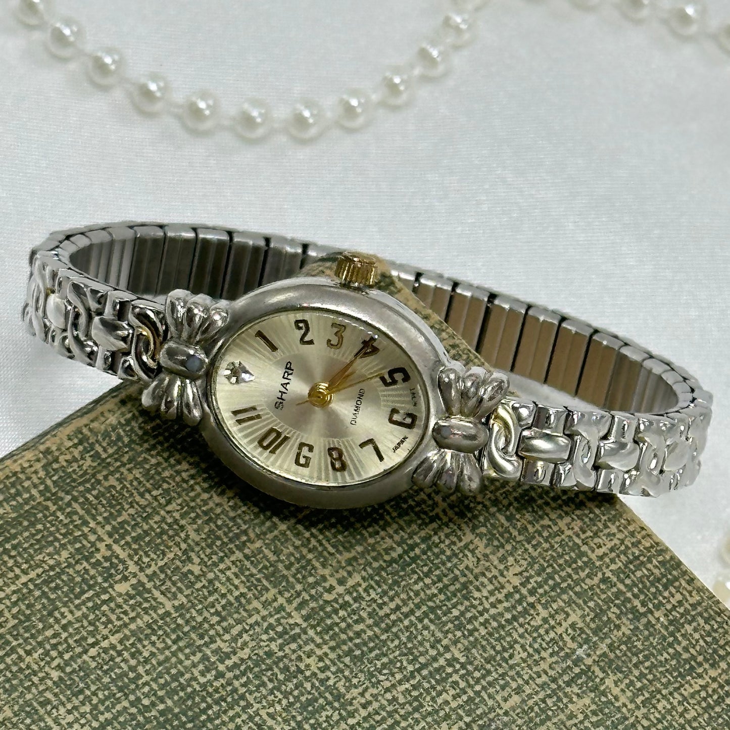 Two-Tone Oval Dial Watch with Bows