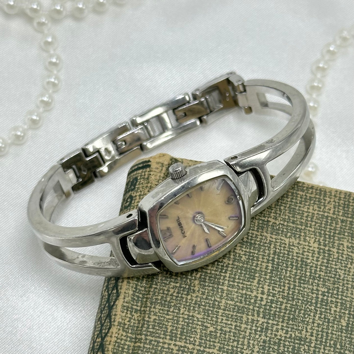 Silver Fossil Cuff Watch with Iridescent Dial