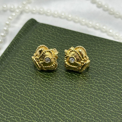 Vintage gold tone Avon regal crown clip on earrings from the 1980's