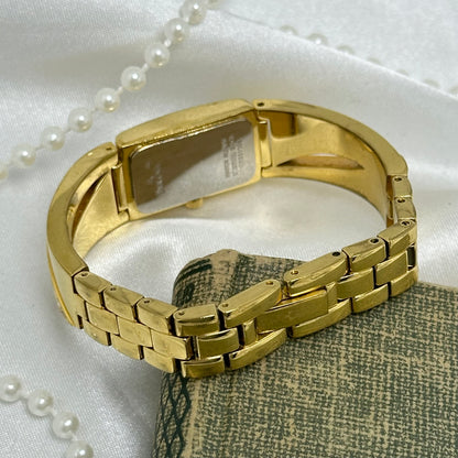 Gold Bulova Watch with Swarovski Crystals and Roman Numeral Markers