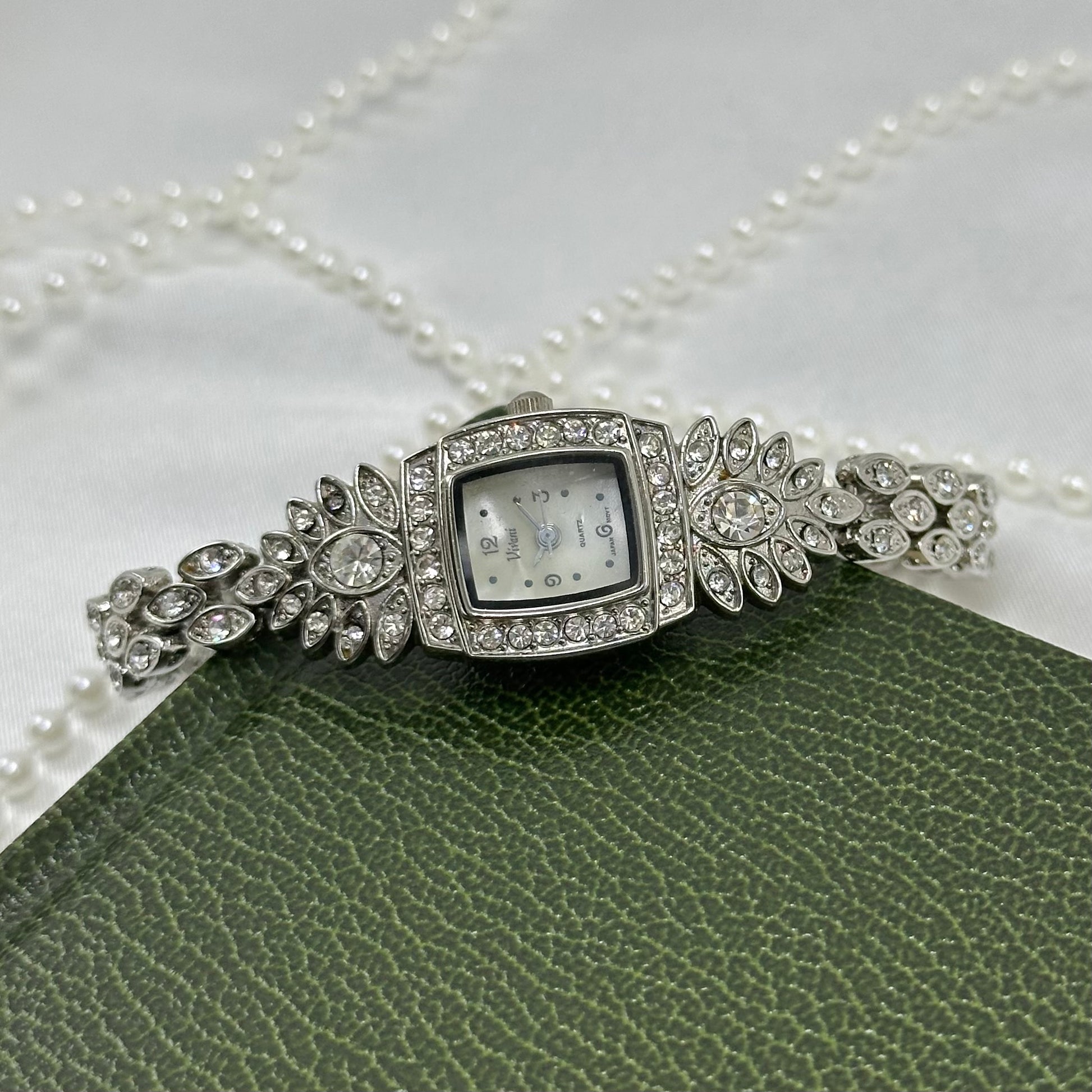 Vintage art deco style crystal Vivani silver tone watch.