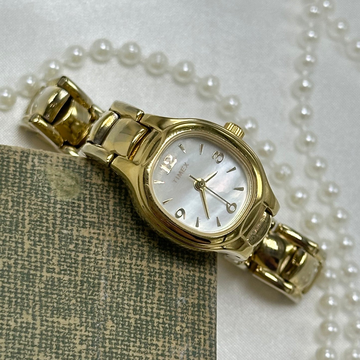 Gold Timex Watch with Mother of Pearl Dial