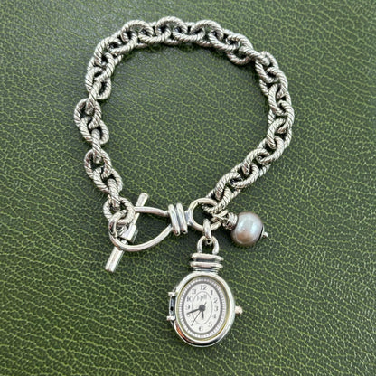 Silver tone J Jill charm bracelet watch with faux gray pearl.