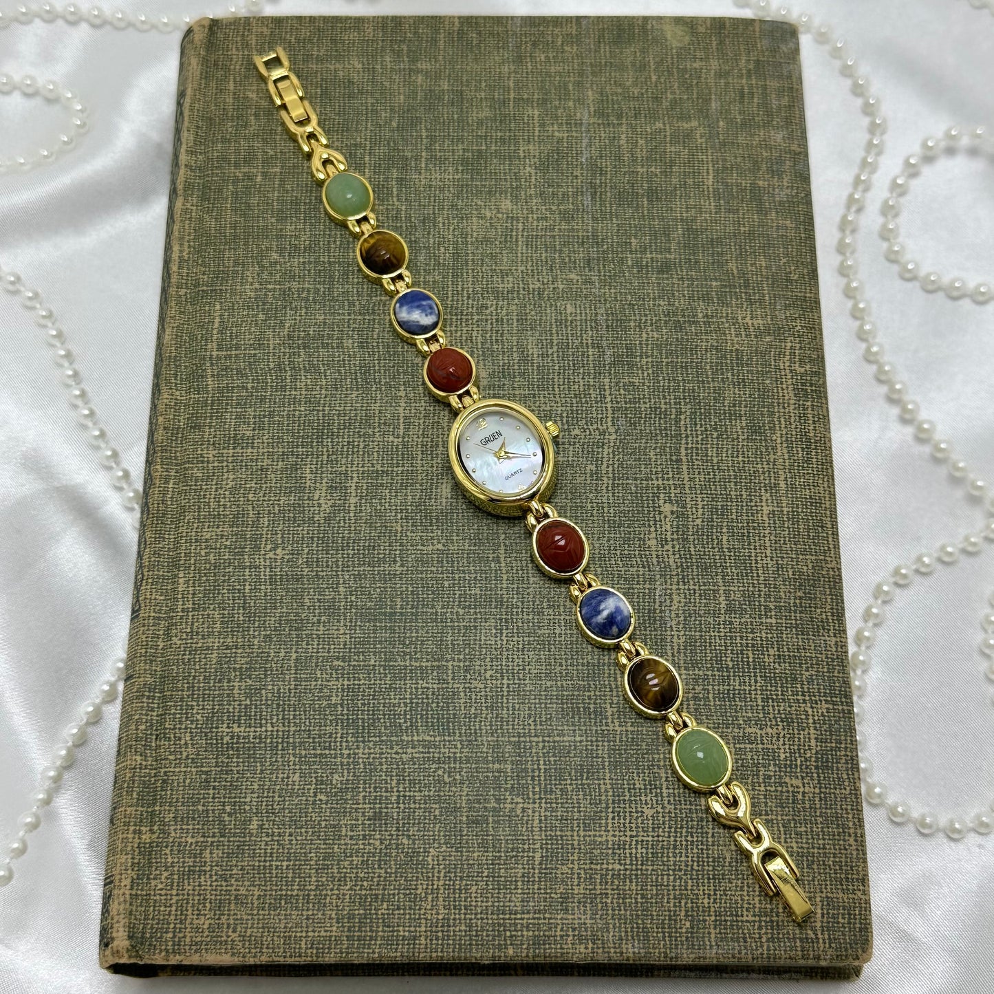 Gold Gruen Scarab Watch with Mother of Pearl Dial