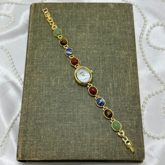 Gold Gruen Scarab Watch with Mother of Pearl Dial