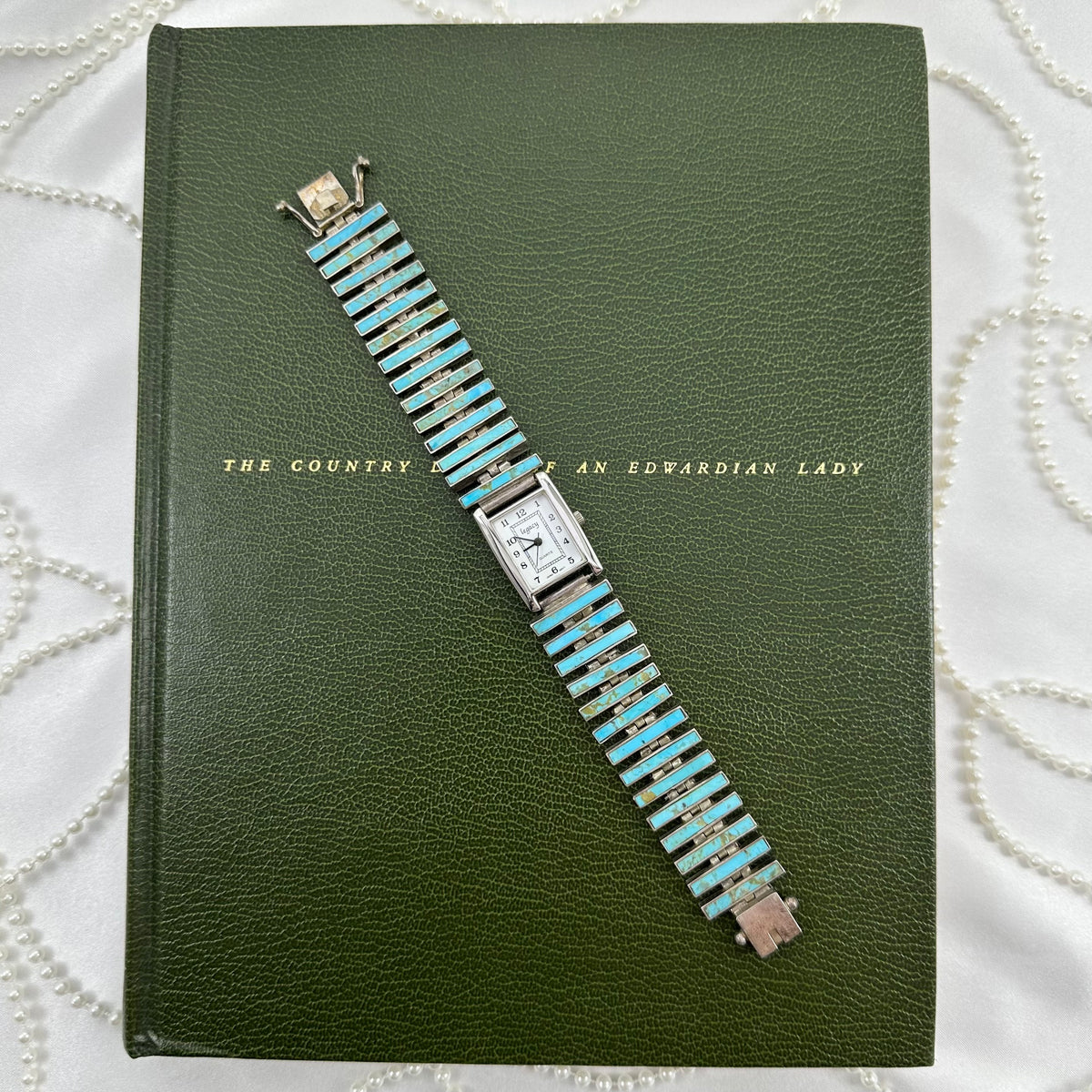 Vintage sterling silver square dial Legacy watch with turquoise stones and slide clasp. Marked "Made in Chile 925".