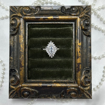 Rhodium plated vintage art deco style silver tone ring with cubic zirconia stones.