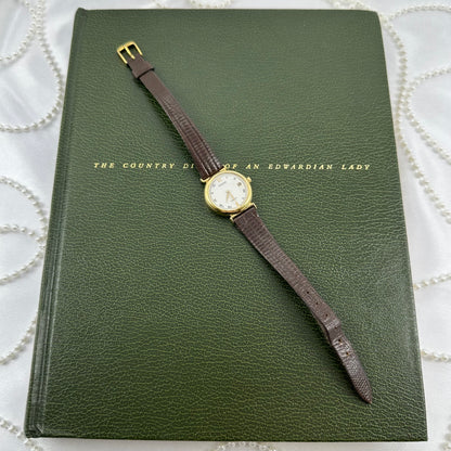 Vintage Gold Pulsar Watch with Brown Leather Band and Date Display