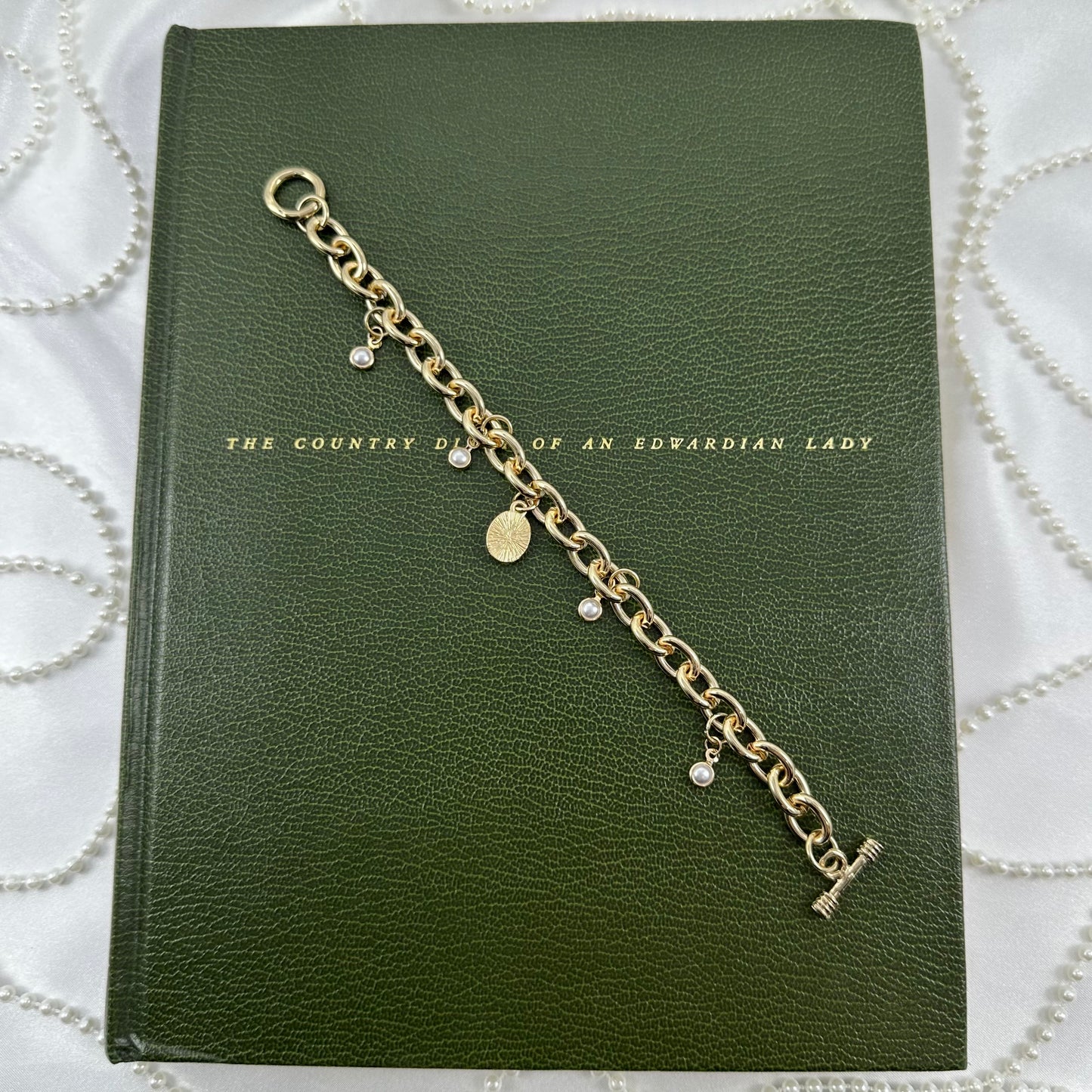 Gold Pearls and Black Cameo Charm Bracelet
