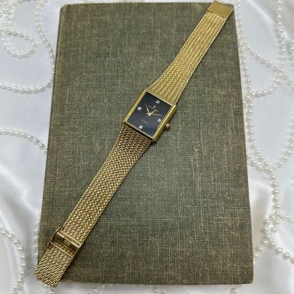 Vintage Pierre Cardin Gold Tank Watch with Black Dial and Diamond Markers