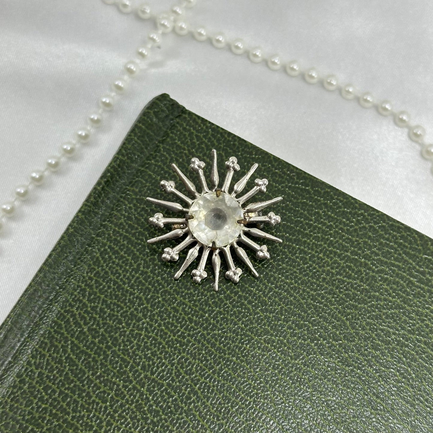 Vintage Silver Starburst Pin