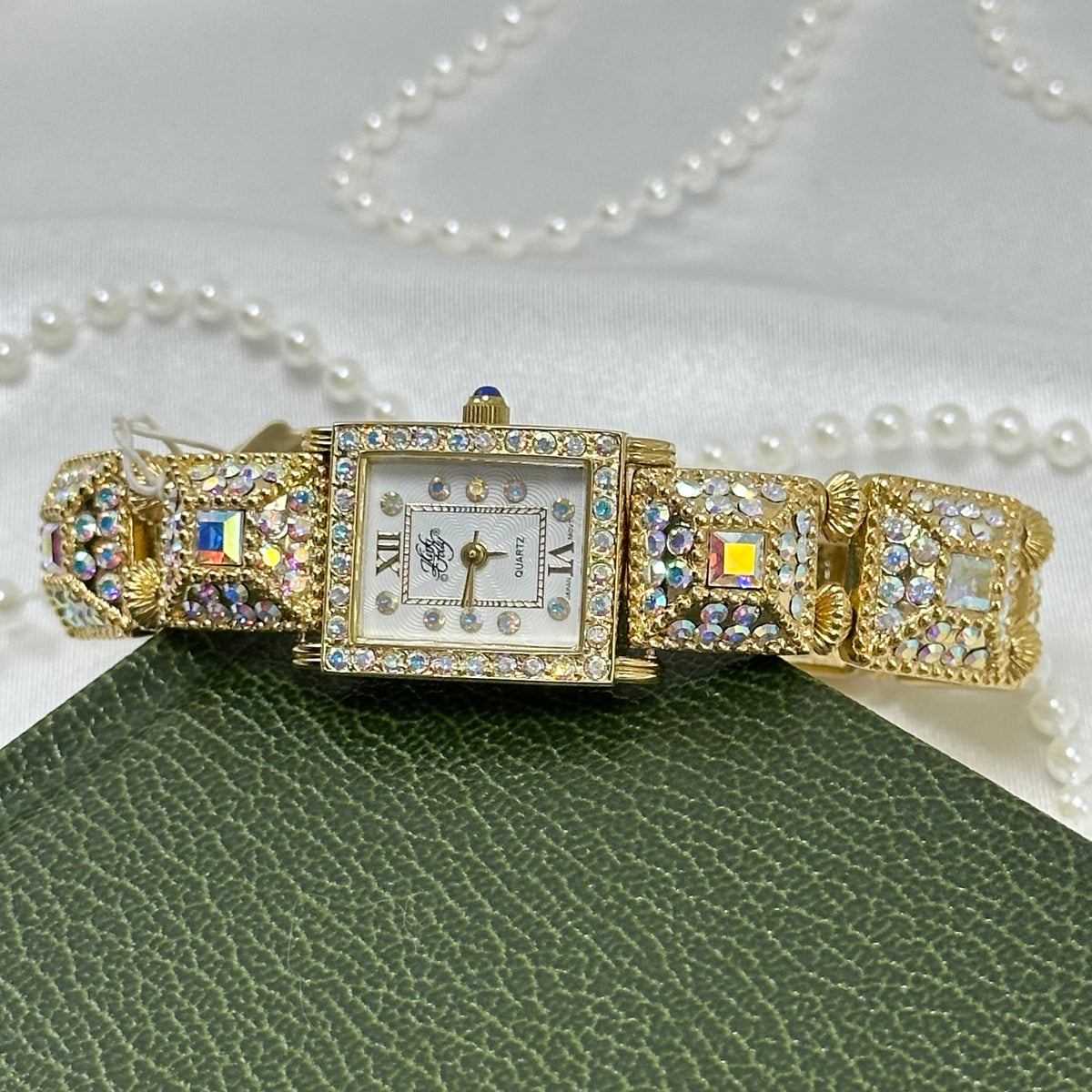 Rare Kirks Folly AB Watch with Blue Jewel Crown