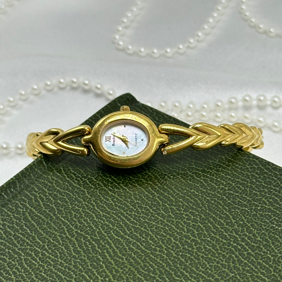 Adorable Gold Armitron Watch with Mother of Pearl Dial
