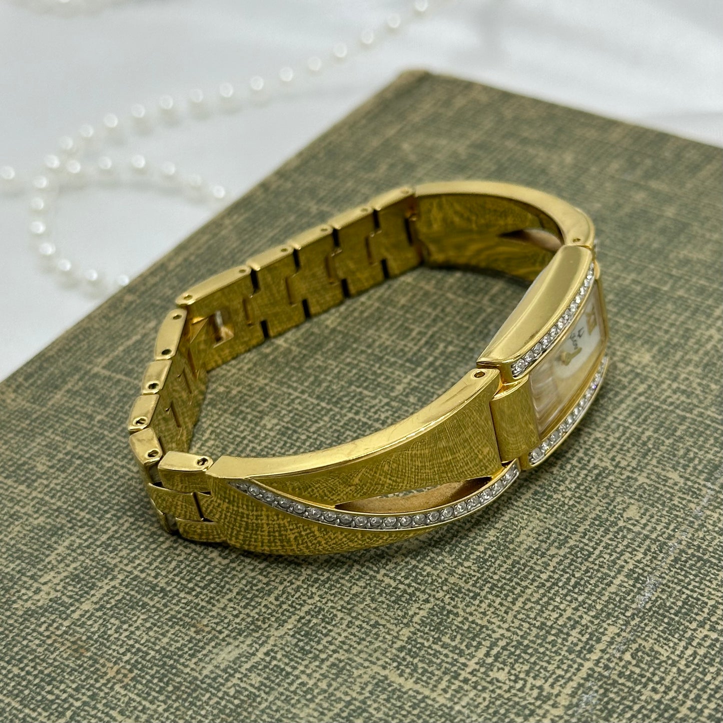 Gold Bulova Watch with Swarovski Crystals and Roman Numeral Markers