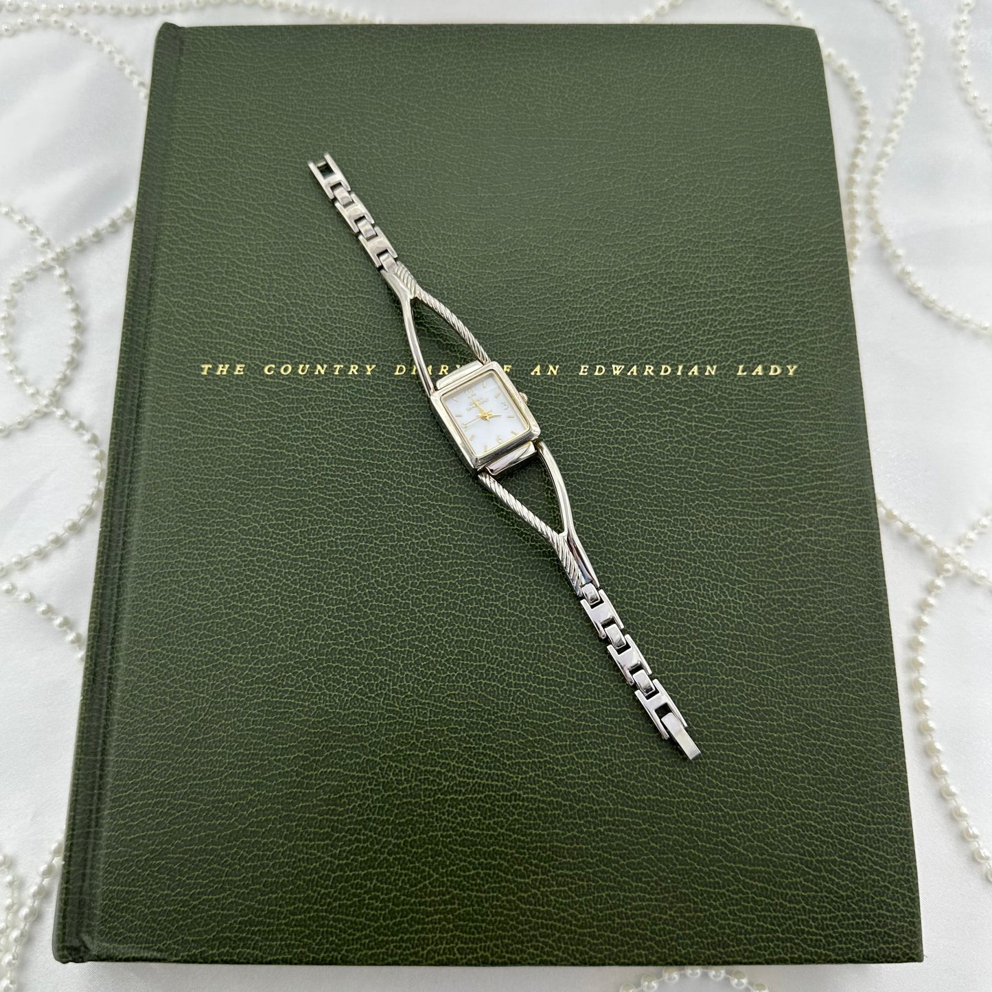 Silver Gloria Vanderbilt Watch with Square Mother of Pearl Dial