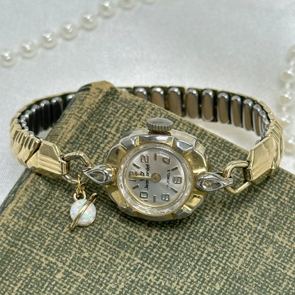 Vintage  1970's Jean Cardot Wind Up Gold Watch with Opal Saturn Charm