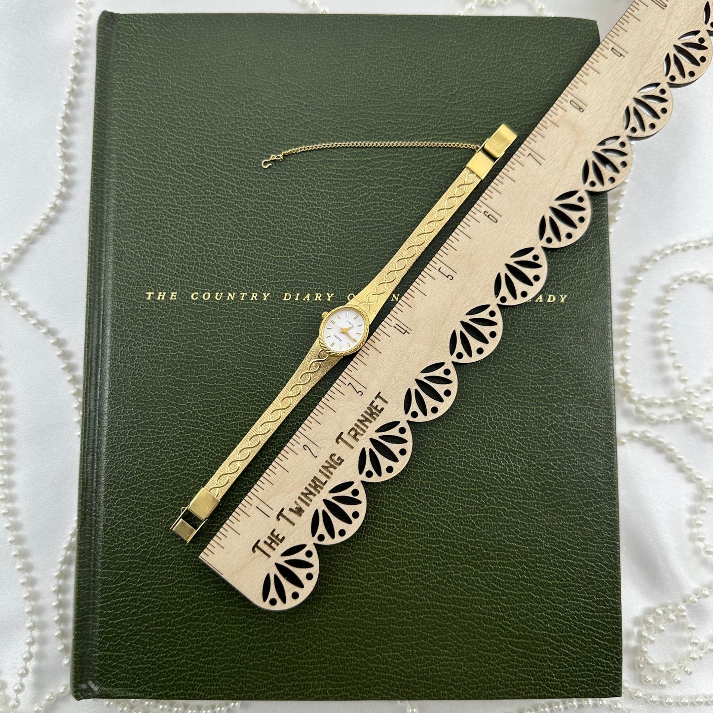 Gold Elgin Watch with Detailed Swirl Band