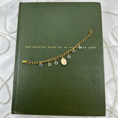 Sarah Coventry Gold Charm Bracelet with Blue Butterfly Cameo