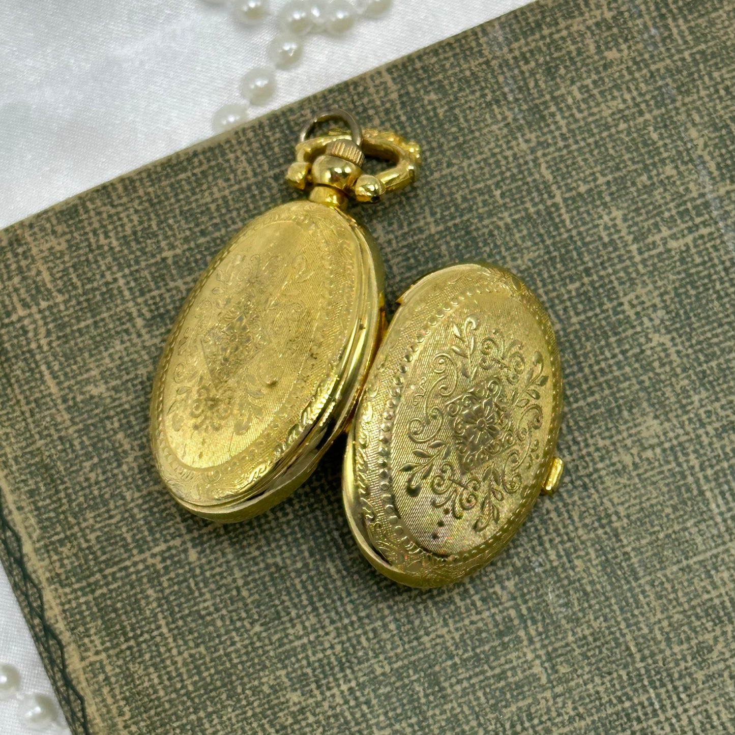 Gold Floral Locket Watch with Butterfly and Flower Picture