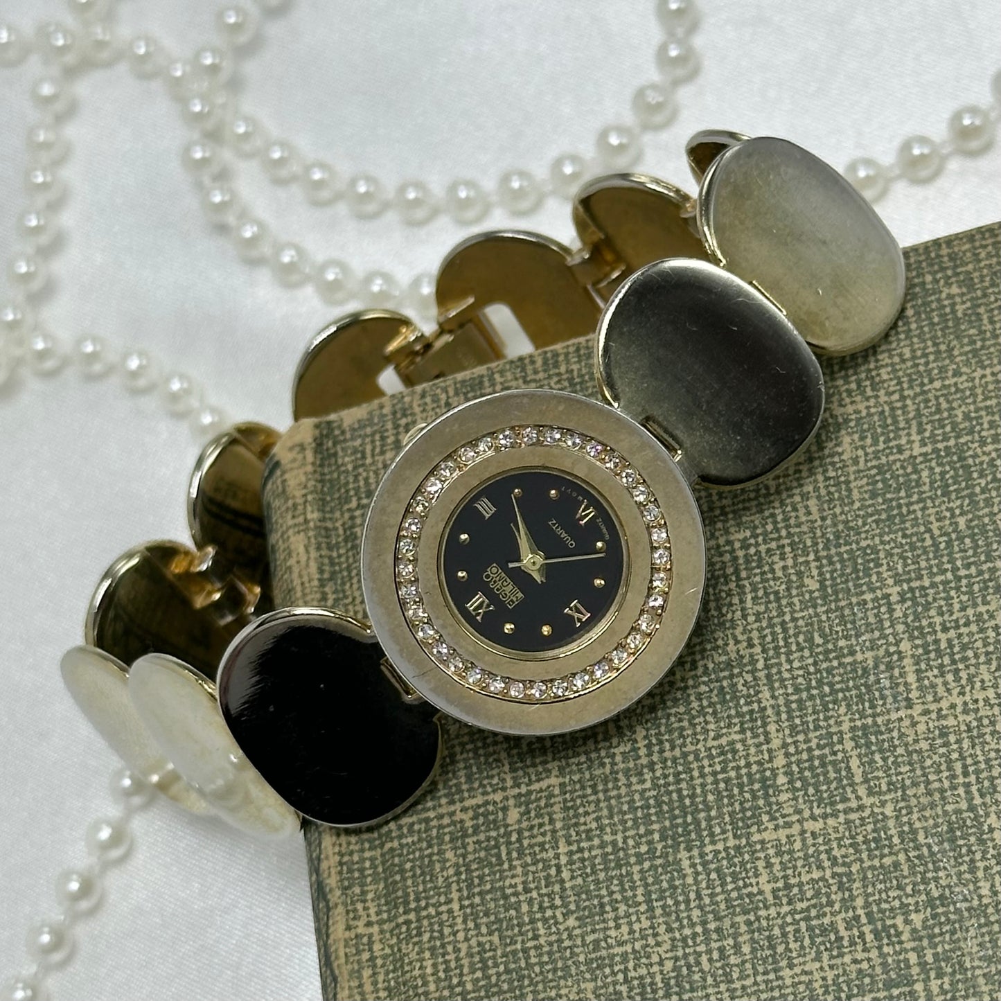 Two-Tone Coin Bracelet Watch with Black Diamanté Dial