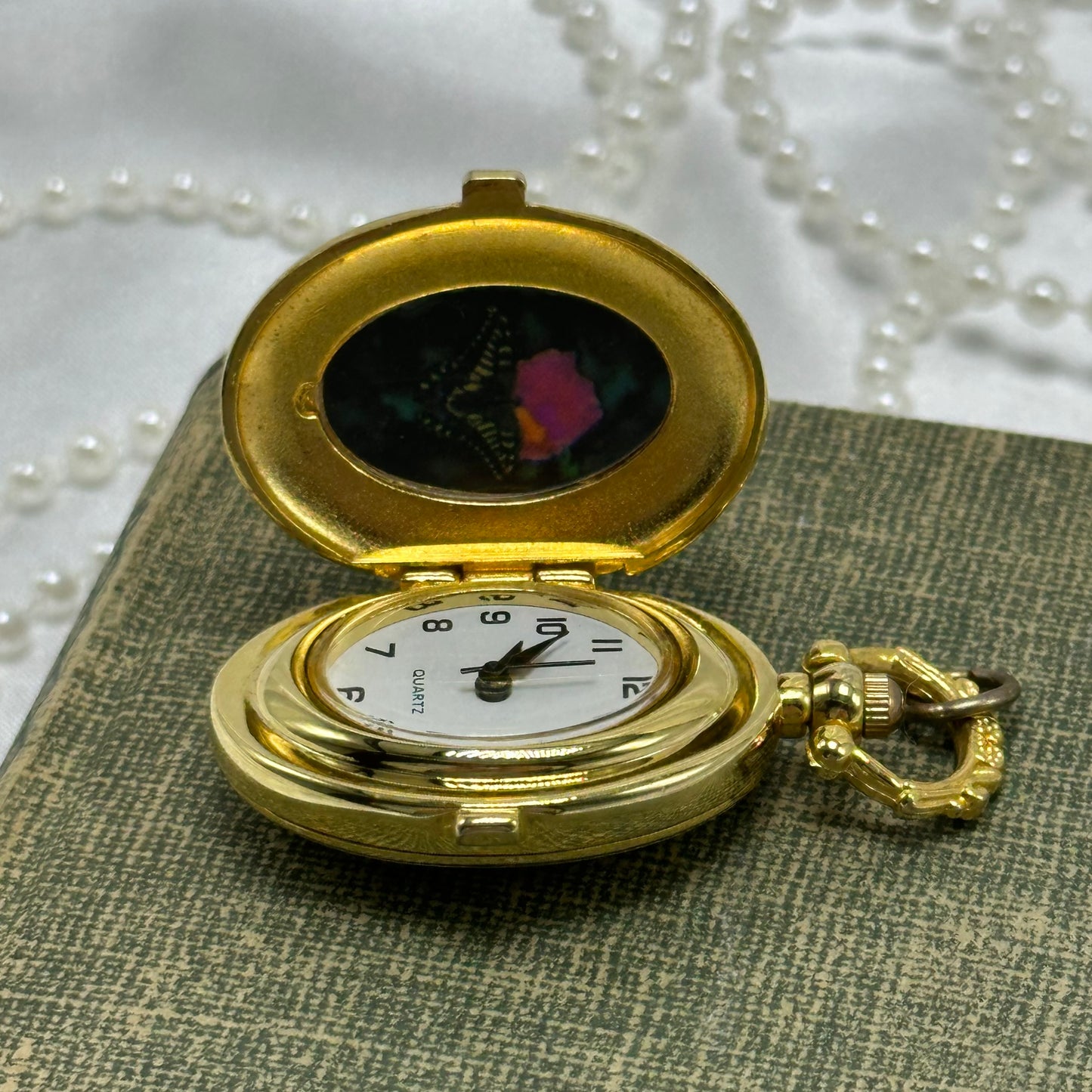 Gold Floral Locket Watch with Butterfly and Flower Picture