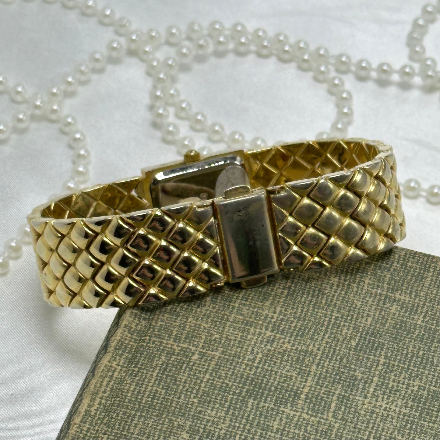 Luxury Gold Tank Watch with Quilted Band