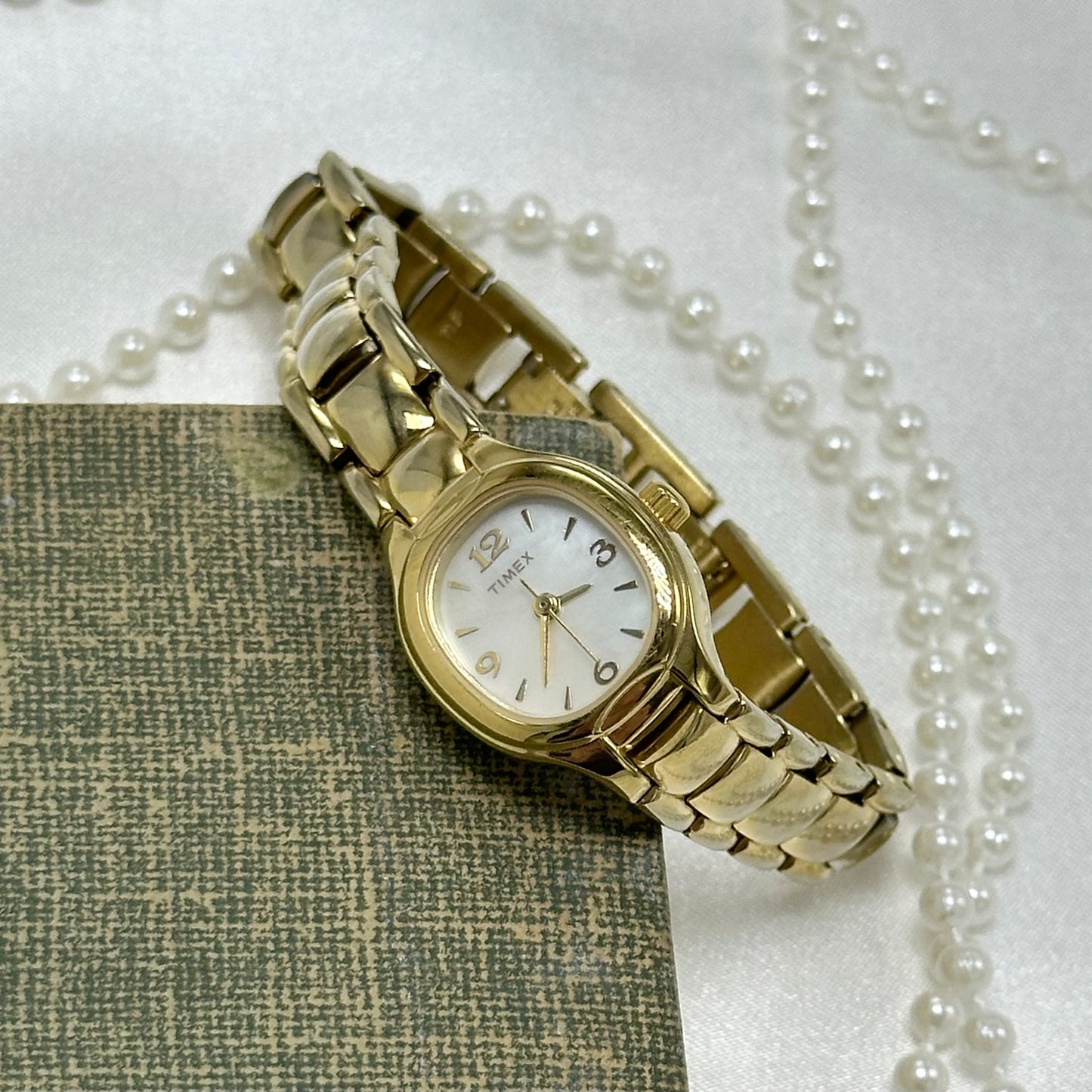 Gold Timex Watch with Mother of Pearl Dial