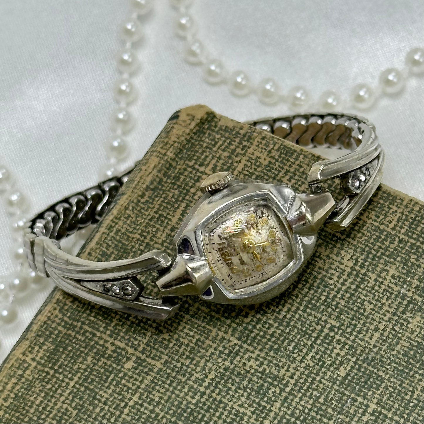 Dainty 10k RGP Silver Bulova Wind-Up Watch with Elegant Band