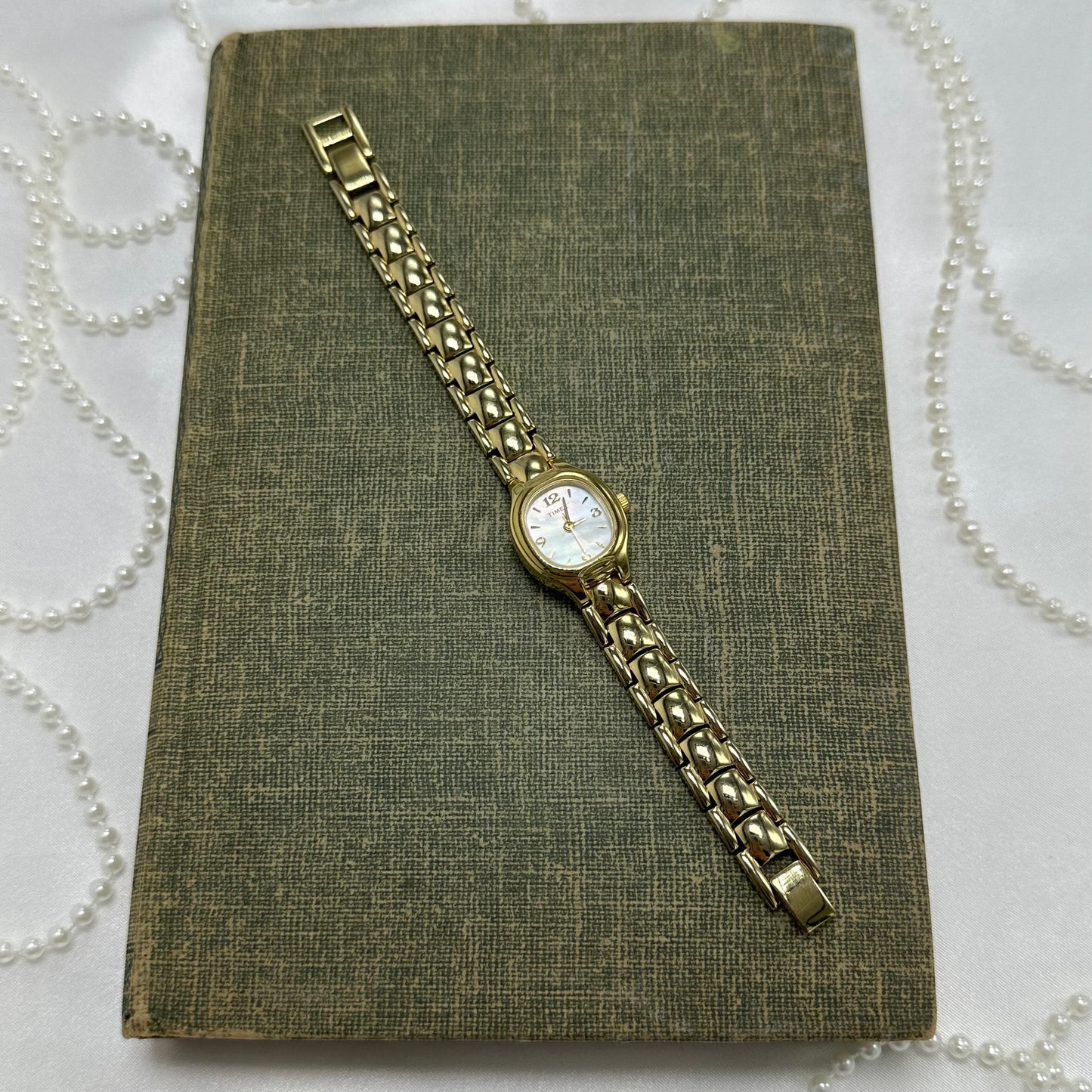 Gold Timex Watch with Mother of Pearl Dial
