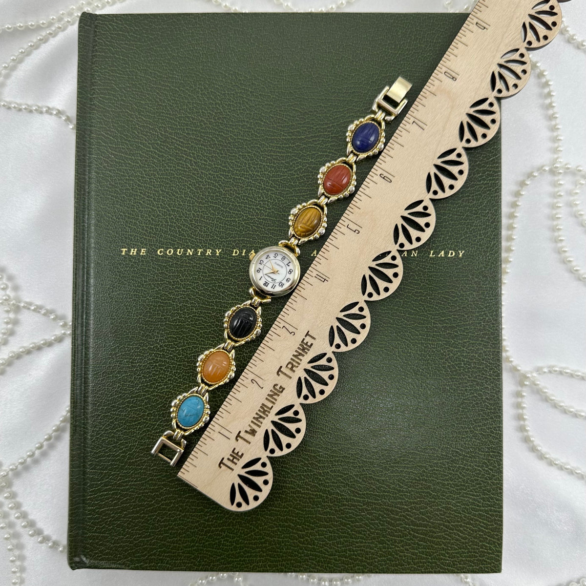 Vintage Gold Scarab Watch with Mother of Pearl Dial