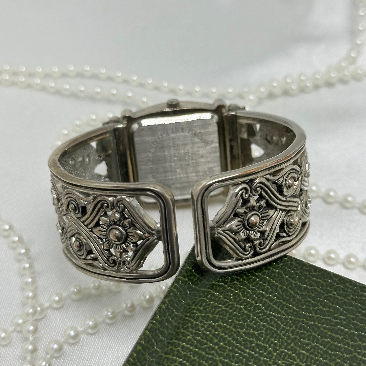 Silver Cuff Watch with Square Dial and Crossed Band